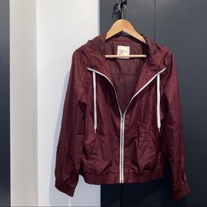 burgundy zip-up zine wind breaker